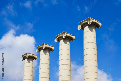 ionic order columns in open exterior space in Barcelona, Spain at the Placa d' Espanya. landmark architectural feature. travel and tourism concept.