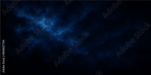 Abstract dark blue background design featuring rays of light piercing through a stormy night sky with textured clouds and motion