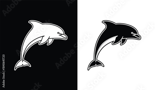 a striking visual contrast is presented with a dolphin silhouette depicted in both a stark white form against a deep black background and a black