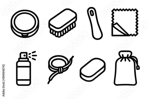 Shoe Care Essentials. Shoe care items linear set: polish tin, soft brush, shoe horn, cleaning cloth, waterproofing spray, lace set, buffing pad, storage bag.