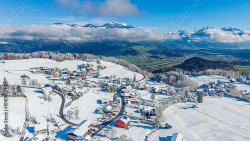 The village of Gurtis with snow by Nenzing, Walgau Valley, State of Vorarlberg, Austria, Drone Photography