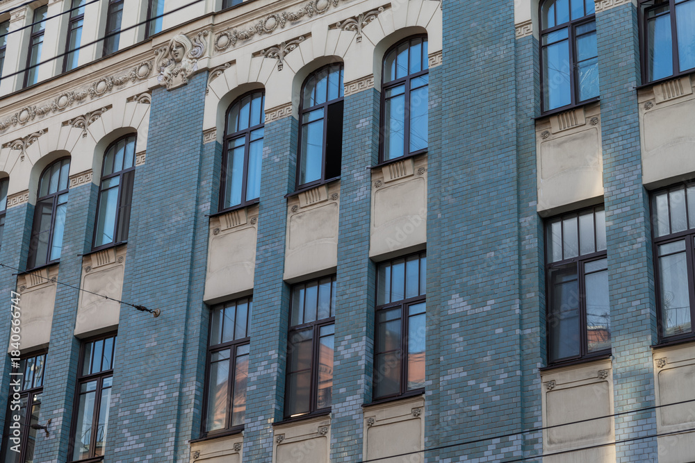 Fototapeta premium Exploring the architecture of Saint Petersburg with historic blue bricks