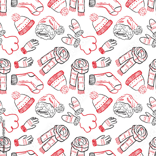 Hand drawn winter warm accessories seamless pattern. Knitted hat, scarf, gloves, mittens, santa hat and christmas stockings. Vector sketch illustration in vintage crayon charcoal style.