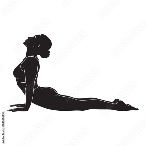 Silhouette of woman in cobra yoga pose for wellness and fitness