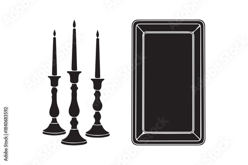 Three ornate candlesticks and a rectangular frame in silhouette