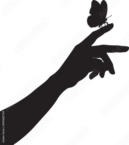 Silhouette of hand with butterfly on finger