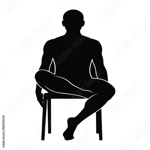 Man's silhouette sitting on a chair with crossed legs, back view