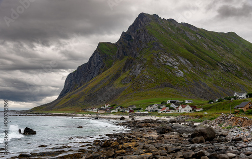 Vikten Lofoten fishing village under dramatic cloudy sky