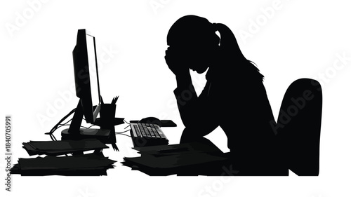 Silhouette of a person experiencing stress while working at a computer and desk