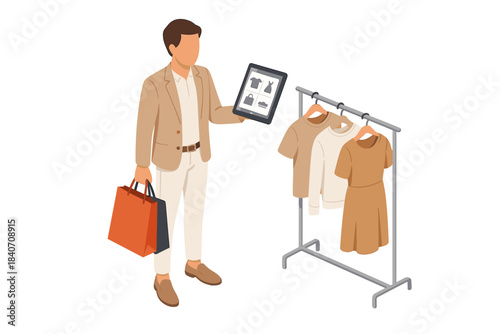 Young male shopping with tablet and clothing rack