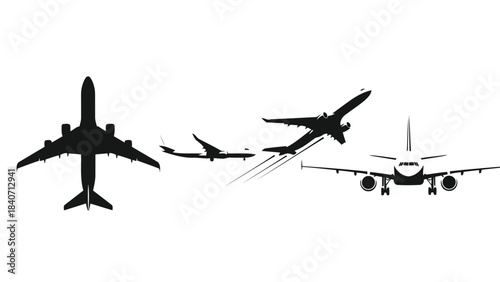 Four airplanes in flight on white background