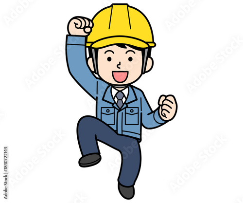 飛び上がって喜ぶヘルメットをかぶった現場監督の男性