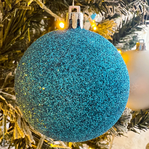 Blue Glitter Christmas Ornament ball Hanging on Tree