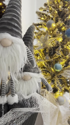 Festive Gnome Decorations by Christmas Tree