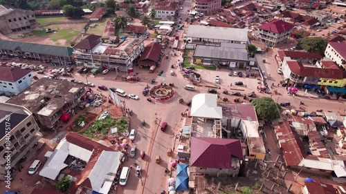Aerial view of Berekum township roundabout in Ghana, bustling with daily life and vibrant urban activity