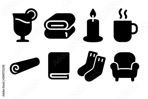 Winter Comfort Icons. Winter comfort. Filled icon set of winter comfort: mulled wine glass, blanket, candle,