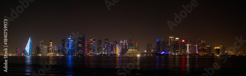 Panoramic view of big city downtown over an ocean galf