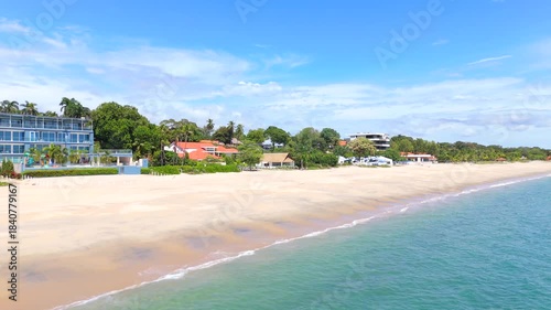 Aerial video taken with a drone on Santa Clara Beach on a sunny day with perfect weather next to the Pacific Ocean, in the province of Coclé, in Río Hato, Panama.	