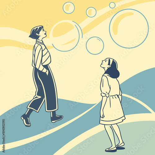 Two people looking up admiring bubbles on a sunny day