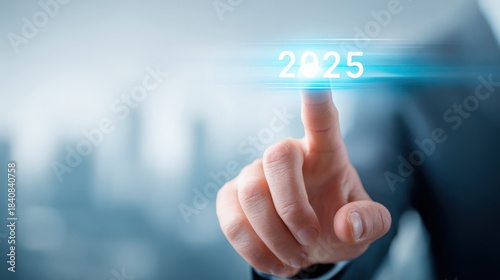 Pointing towards 2025 representing future business strategies, technology trends, or financial growth with a modern and futuristic design