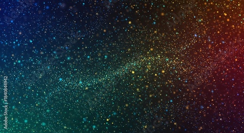 A mesmerizing display of vibrant particles creates a dynamic and colorful abstract background.