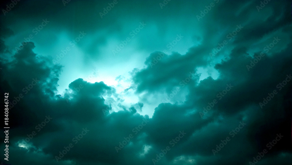 Obraz premium Dramatic sky with deep teal clouds