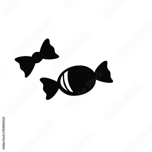 Two black candies are shown in silhouette against a white background.