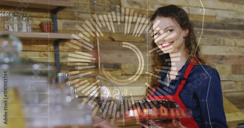 Bakery server lifting cloche and revealing bundt cake for cafe display, radial overlay appearing