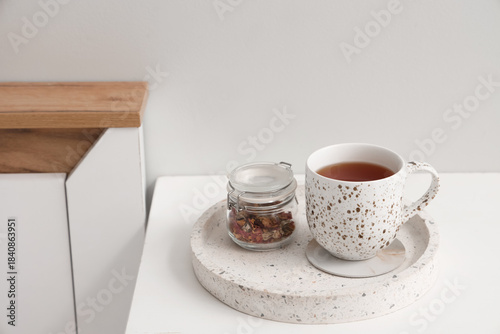 Coaster with cup of tea and...