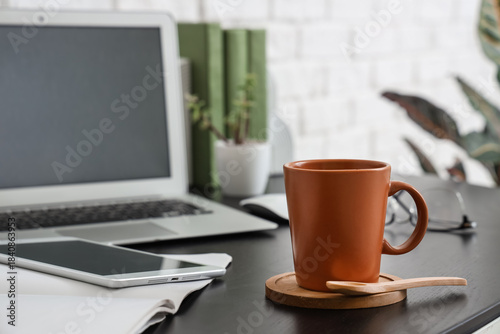 Cup of coffee with wooden c...