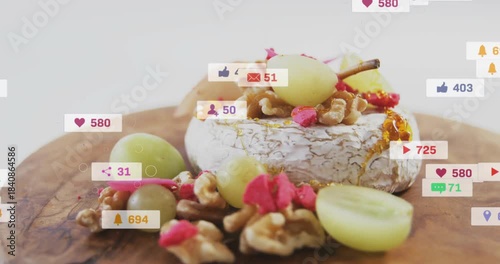 Round cheese wheel getting honey as icons popping after UI element appearing showing social buzz