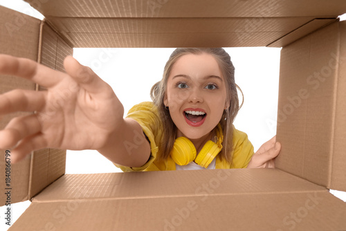 Happy young woman with open...