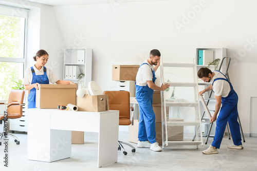 Young loaders working in of...