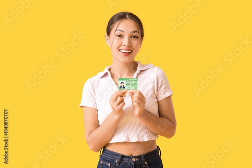 Young Asian woman with driv...