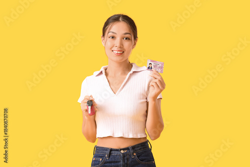 Young Asian woman with driv...