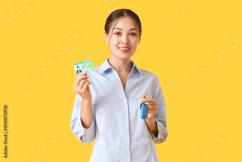 Young Asian woman with driv...