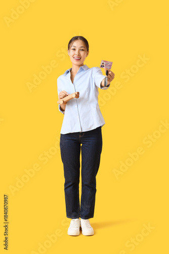 Young Asian woman with driv...
