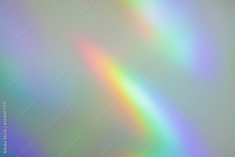 Naklejka premium Abstract blur holographic rainbow foil iridescent background