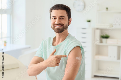 Young man pointing at appli...