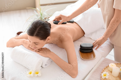Young woman getting massage...