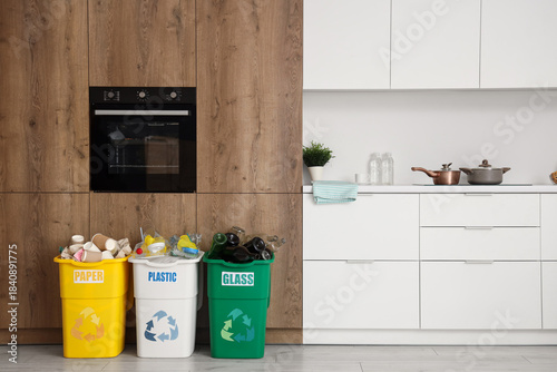 Full trash bins with differ...