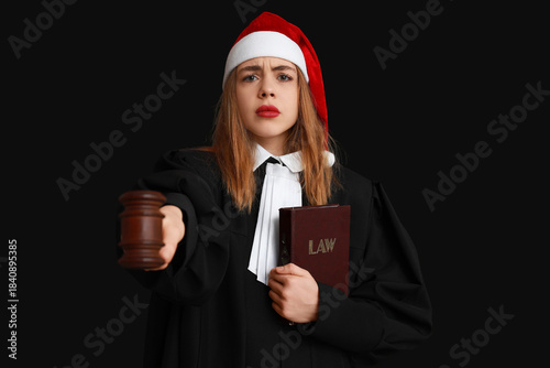 Young female judge in Santa...