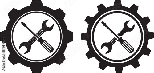 Two crossed wrench and screwdriver tools inside gear silhouette