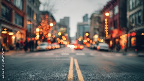 Wallpaper Mural A city street scene featuring blurred lights and buildings, capturing a lively atmosphere with a focus on the road's perspective. Torontodigital.ca