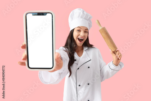 Happy female chef with blan...