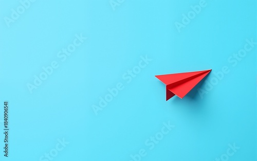 Small business concept with small red paper plane on blue background. High quality