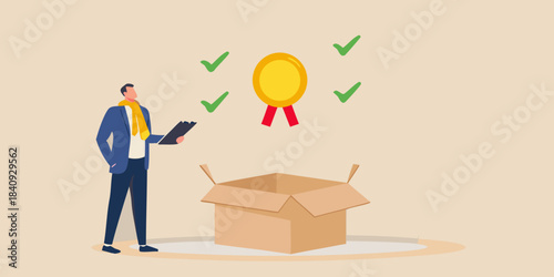 A man reviewing a golden award emerging from an opened cardboard box