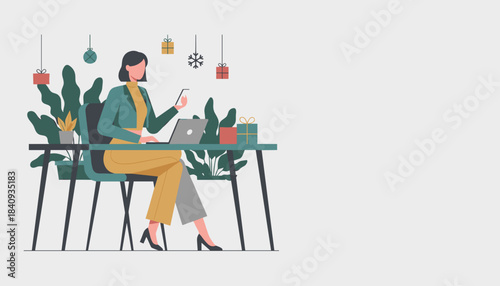 Professional woman working at a festive desk with a laptop and phone illustrating holiday business or remote work