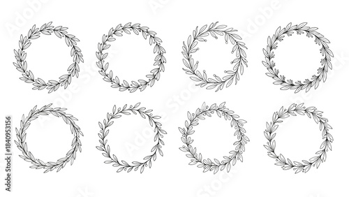 Set of eight delicate hand-drawn botanical leaf wreath designs