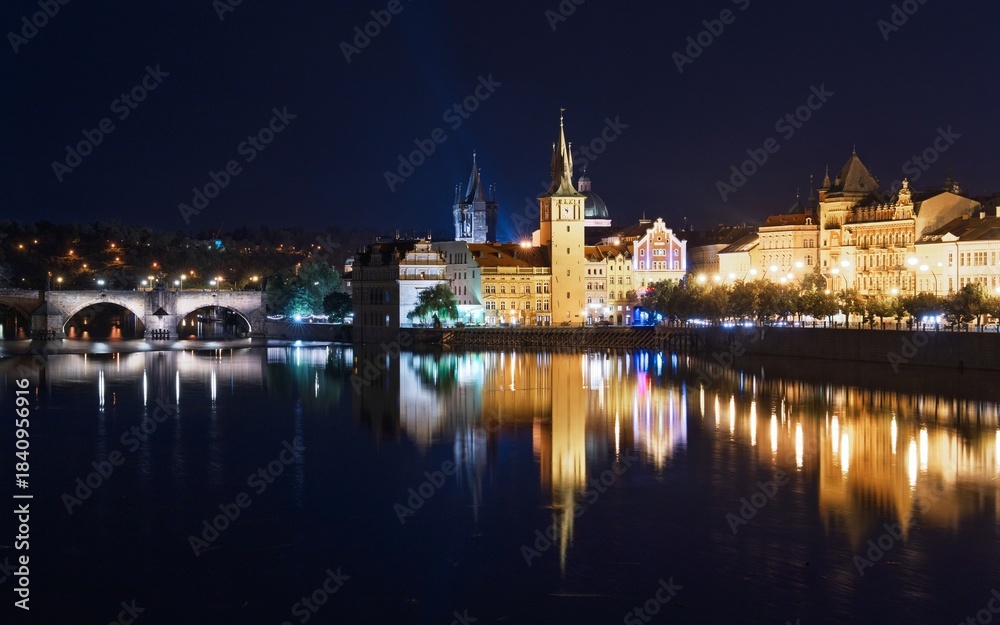 Fototapeta premium Explore the enchanting Prague, Czechia, at night. This stunning image features the illuminated skyline, iconic Charles Bridge, and the Vltava River, capturing the city s magic.